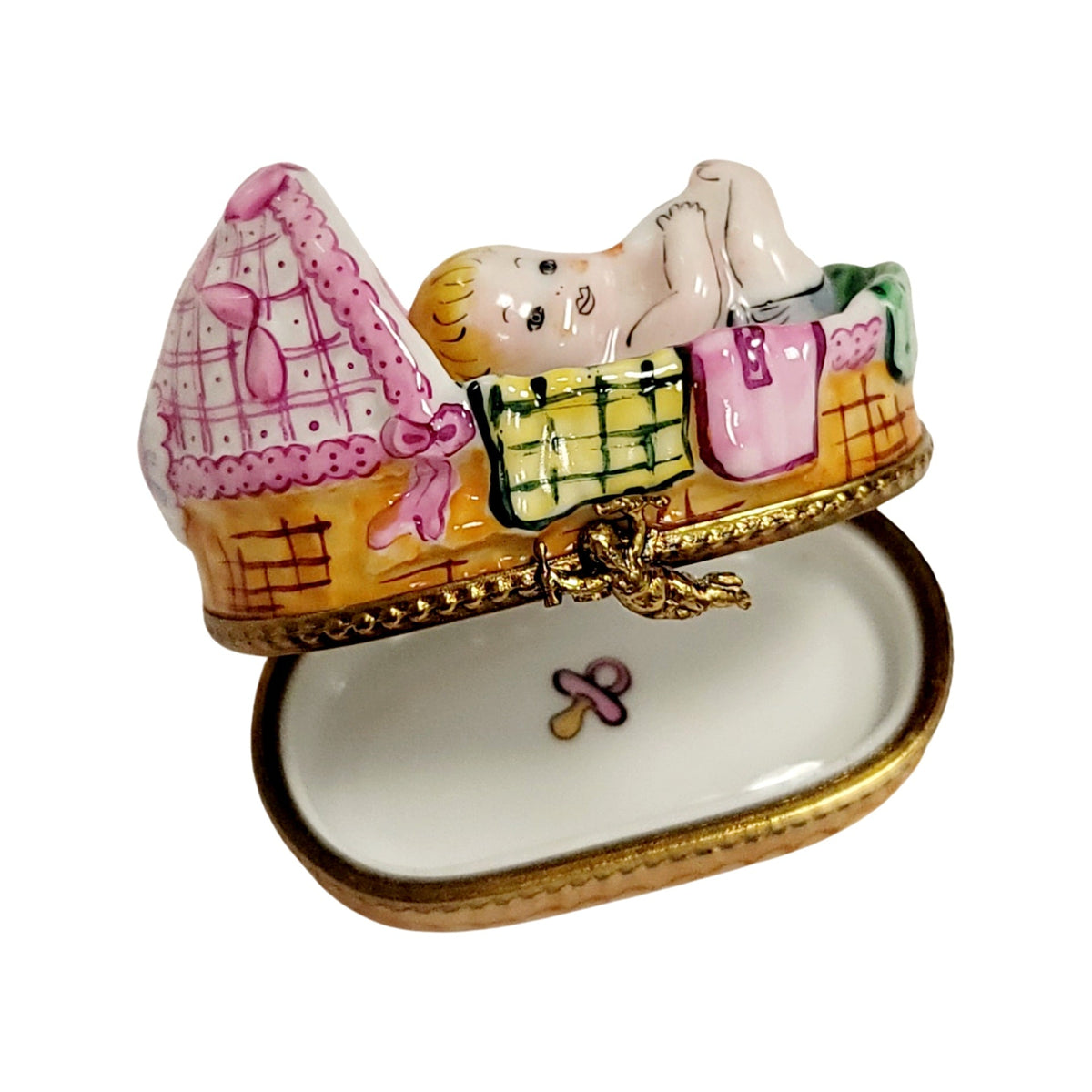Fine French craftsmanship on the Baby in Basket Sleeping Limoges box, painted by hand