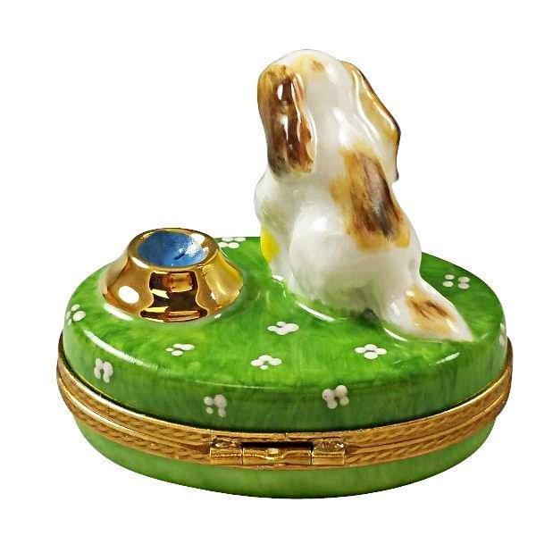 Spaniel Puppy with Ball and Bowl Limoges box, an heirloom-quality piece for collectors