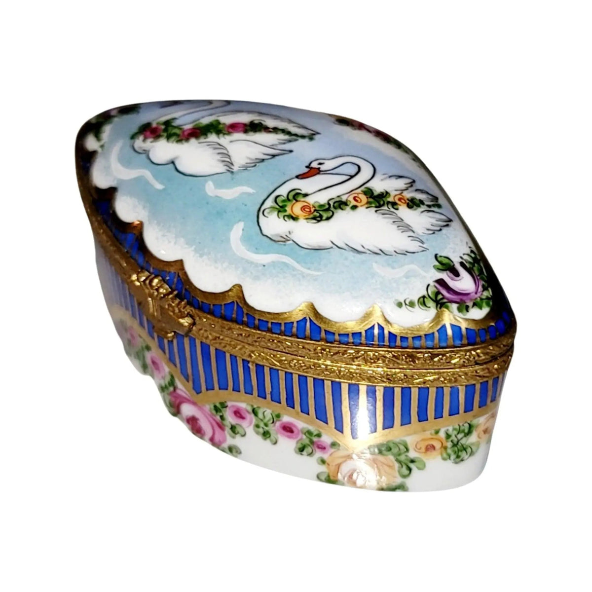 Every brushstroke by hand on the Swans Traditional Sevre Roses Limoges box from France