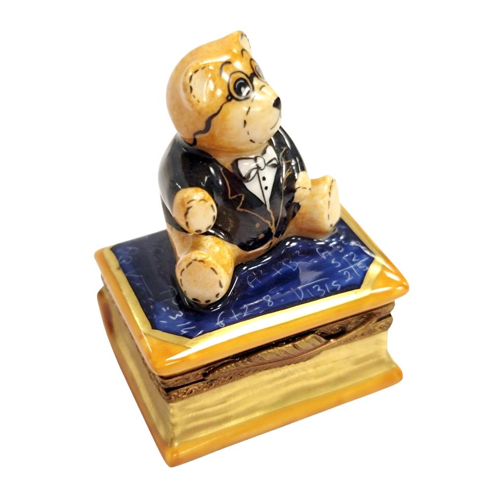 Limoges Boutique presents the Teddy Bear on Math Book Graduation, a genuine Limoges box painted by hand in France