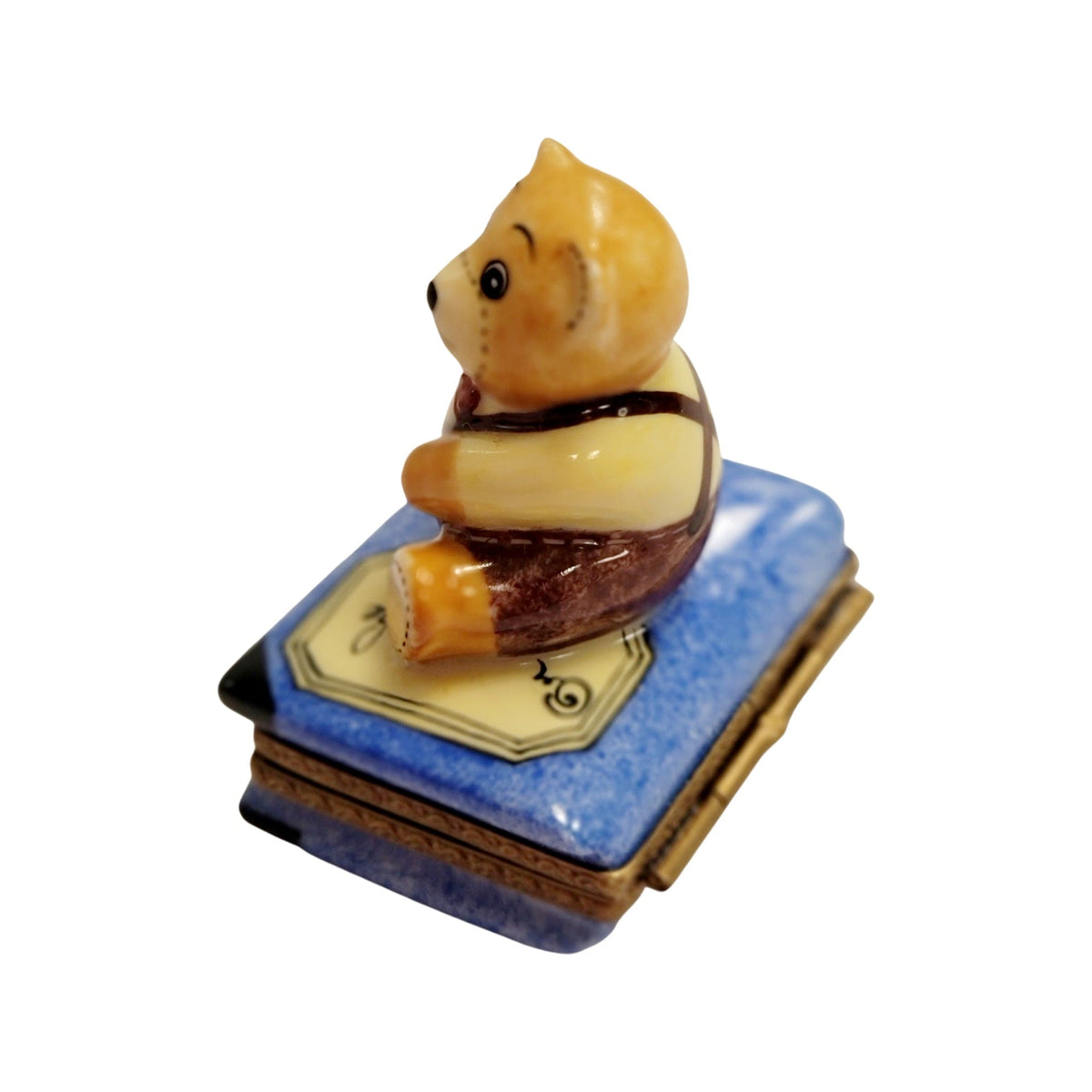 The painter's artistry shows on this Teddy Bear on Blue Book Limoges box