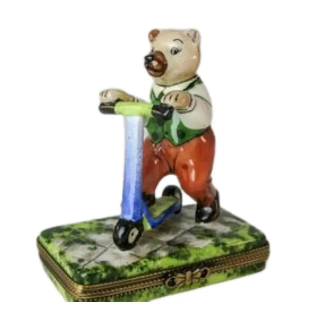 Teddy Bear on Scooter Porcelain Limoges Porcelain Art Object, a hand-painted Limoges porcelain gift