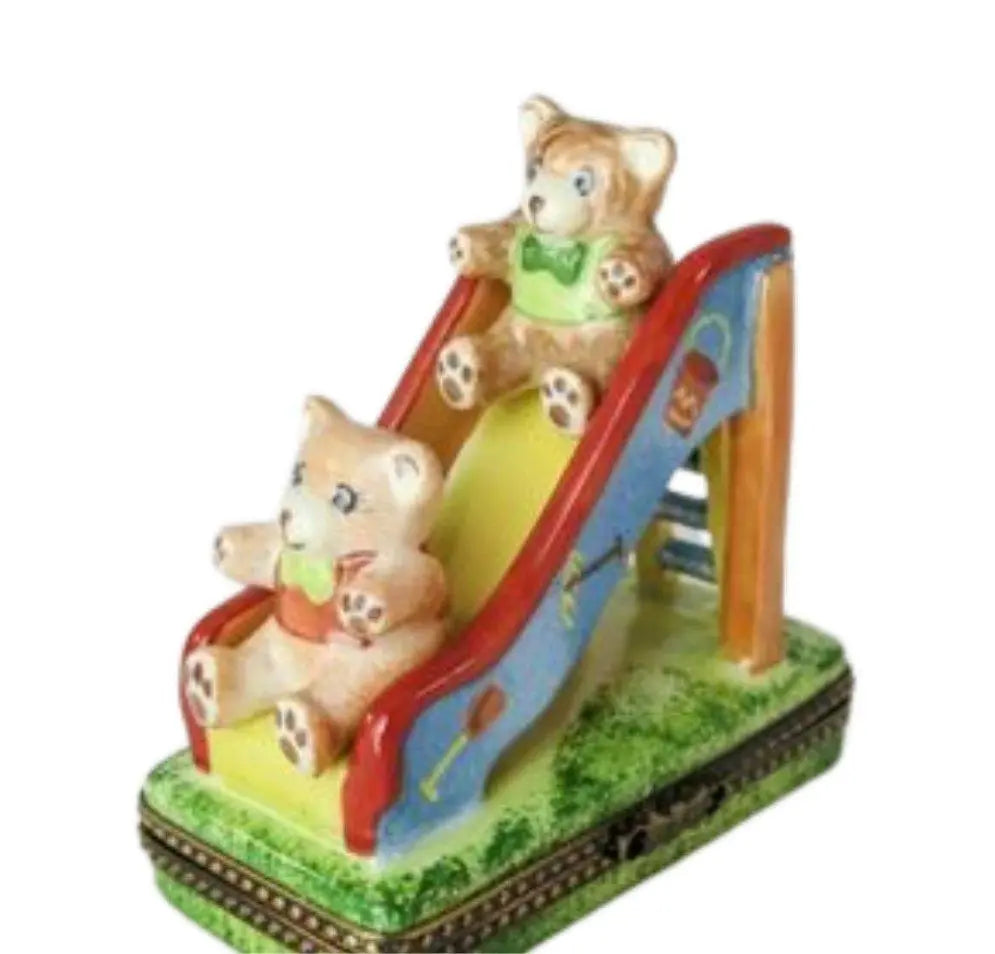 Teddy Bear on Slide Porcelain Limoges Porcelain Art Object, a hand-painted Limoges porcelain gift