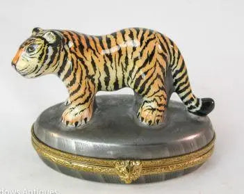The painter's artistry shows on this Tiger Oval Limoges box