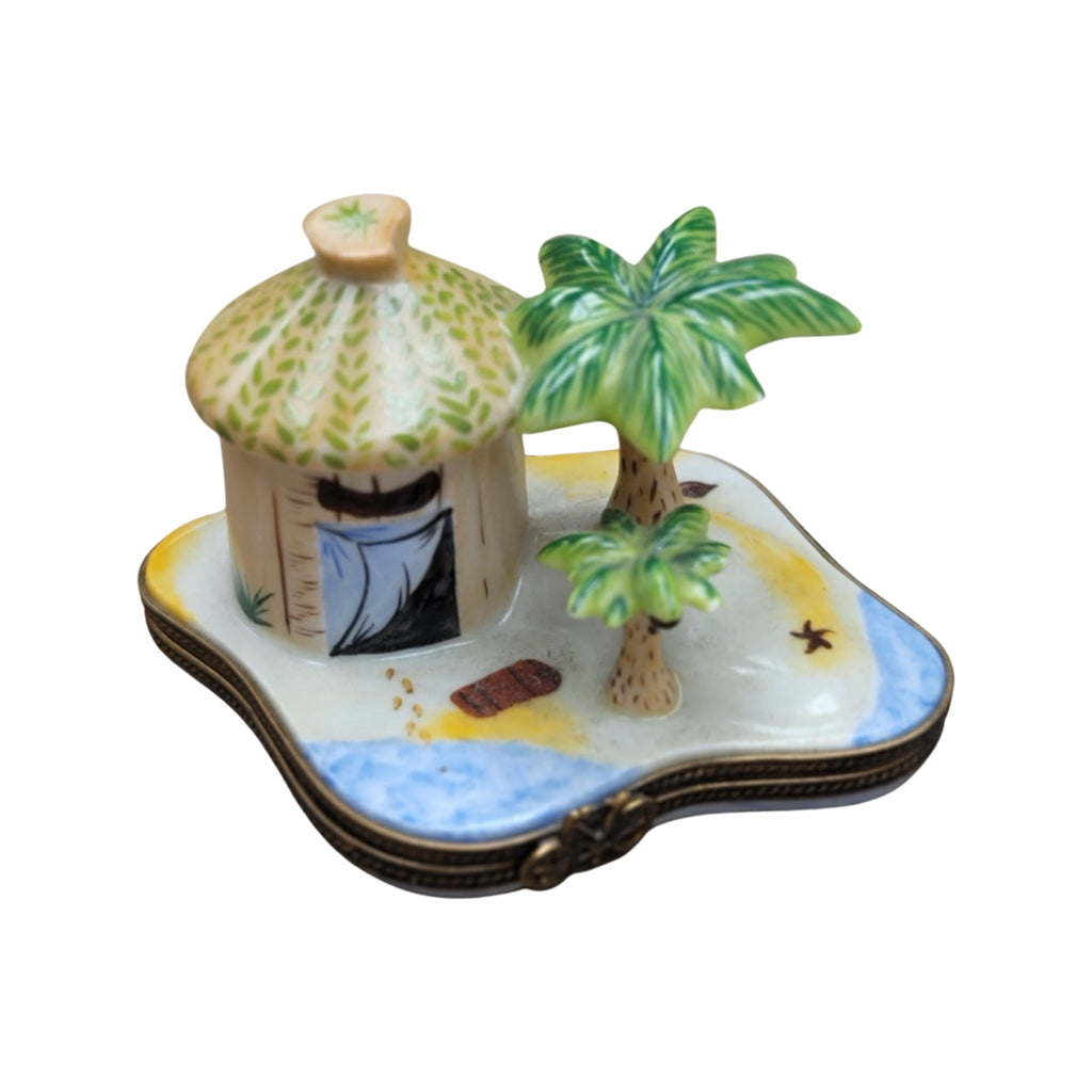 Artisan-painted Beach Tiki Hut Limoges box from France, a cherished collectible