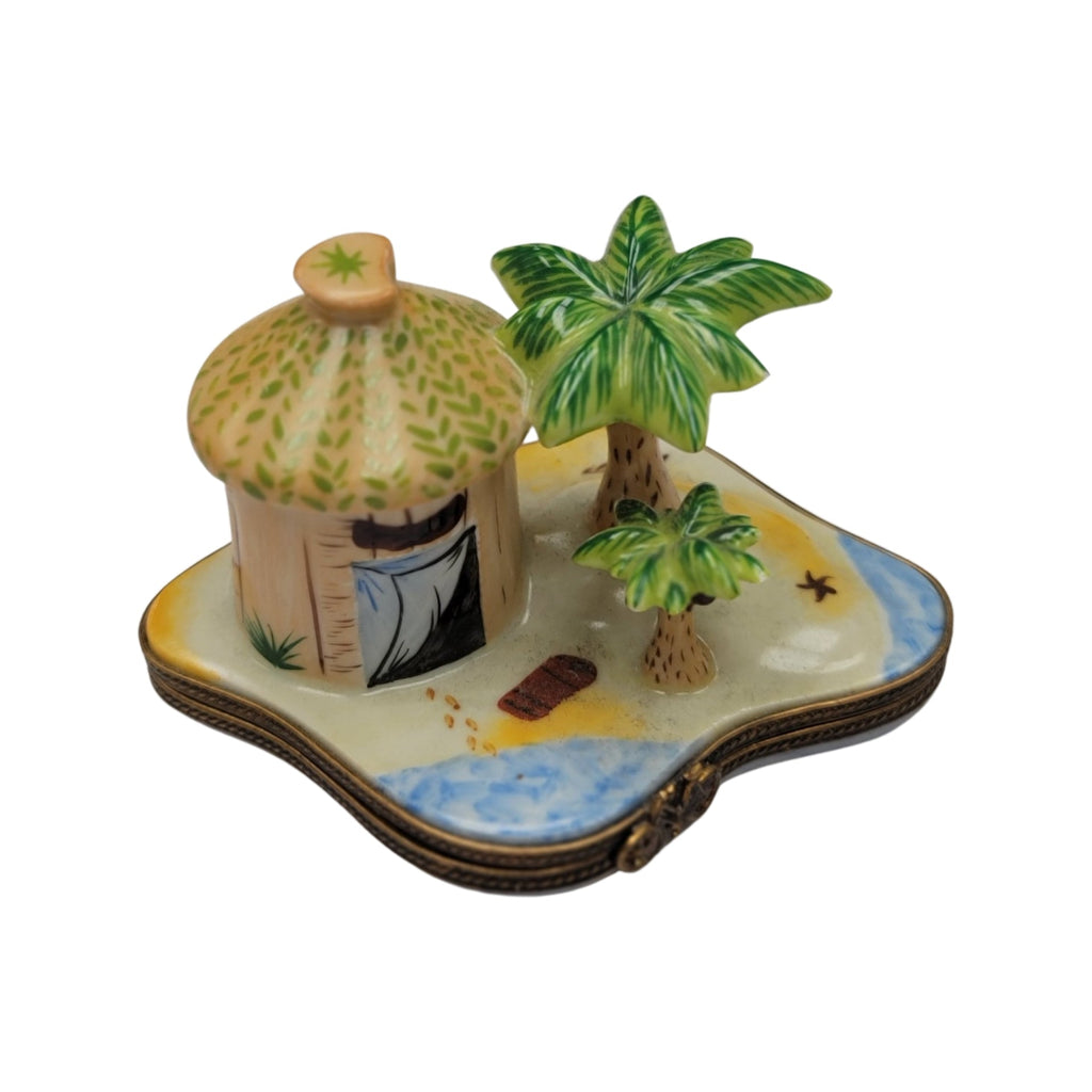 The painter's artistry shows on this Beach Tiki Hut Limoges box