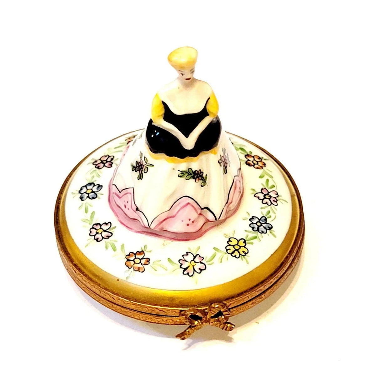 Fine art lovers will admire this Evita Oleta Woman Dressed Victorian Limoges box