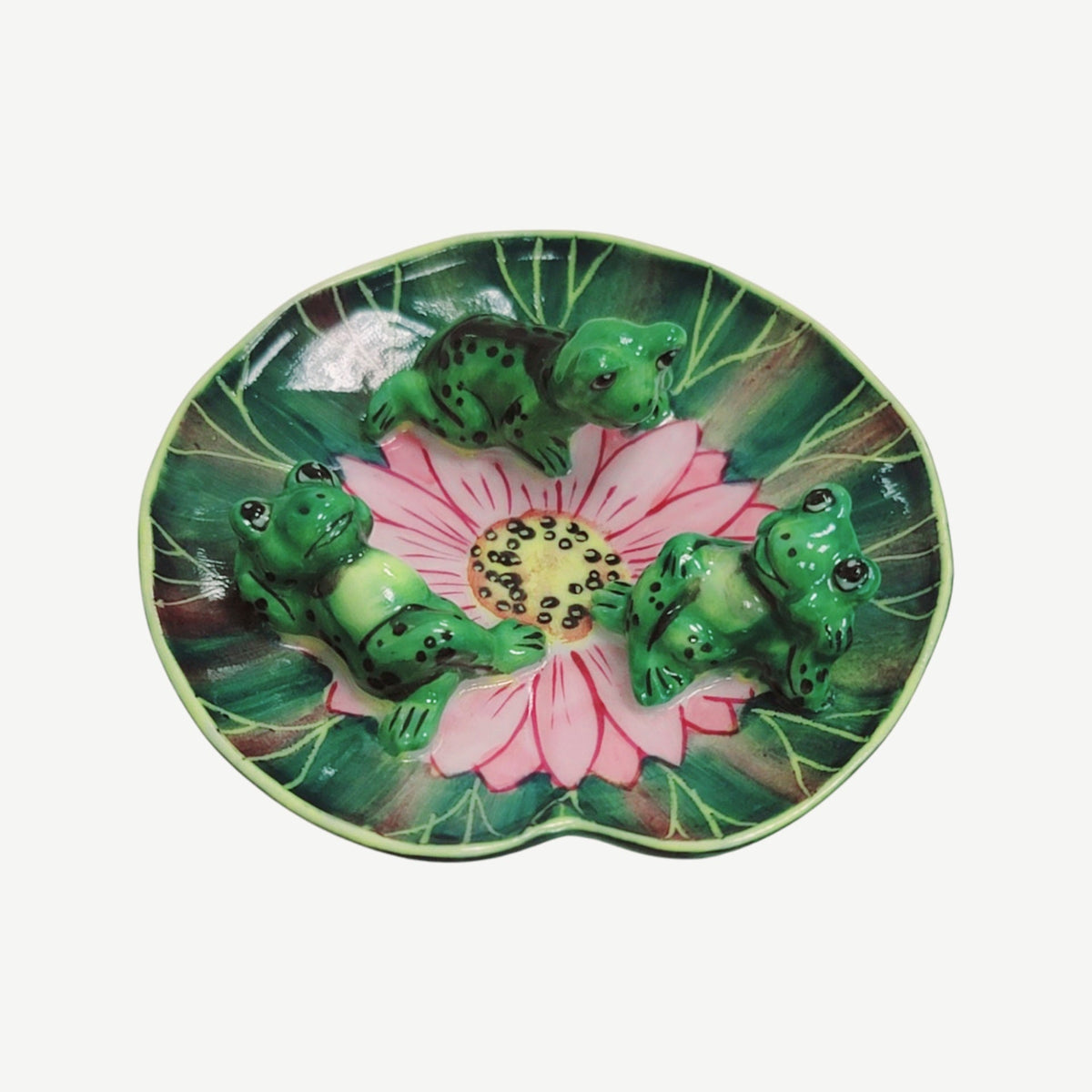 3 Frogs Laying Lillypad Limoges box, an heirloom-quality piece for collectors