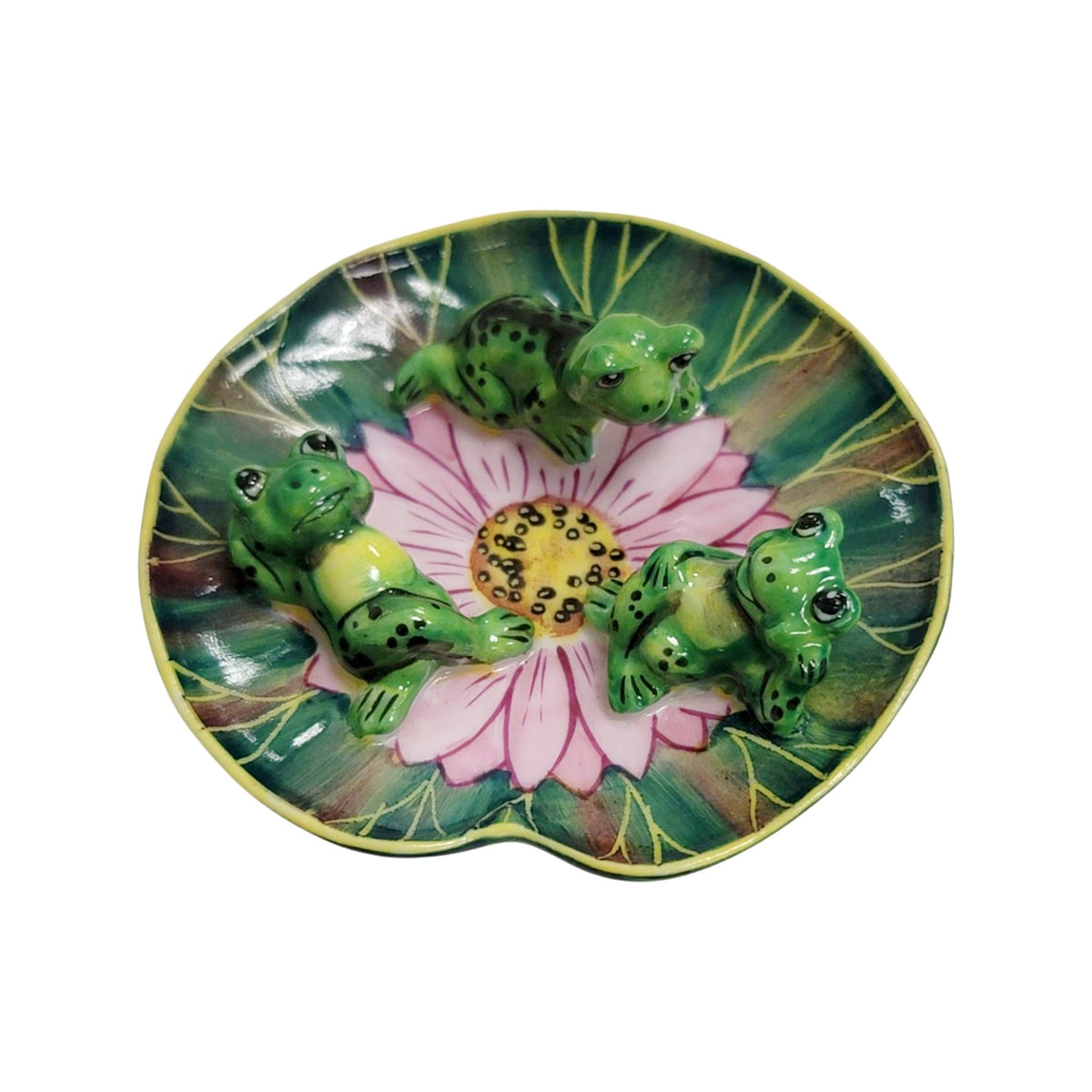 Painted details on the 3 Frogs Laying Lillypad Limoges box, French art in miniature