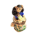 Monkey Blue Jeans on Stump Limoges Box, a hand-painted Limoges porcelain gift