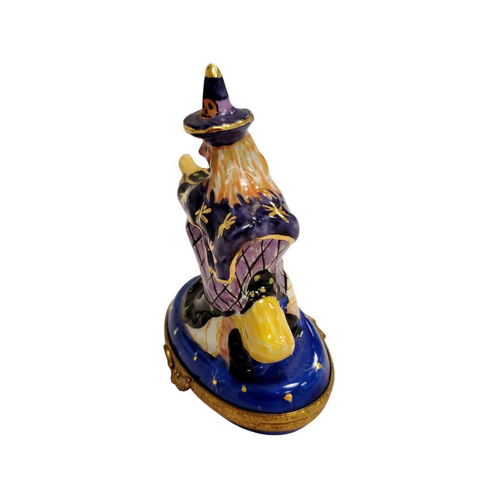 Fine French craftsmanship on the Witch on Broom Limoges box, painted by hand