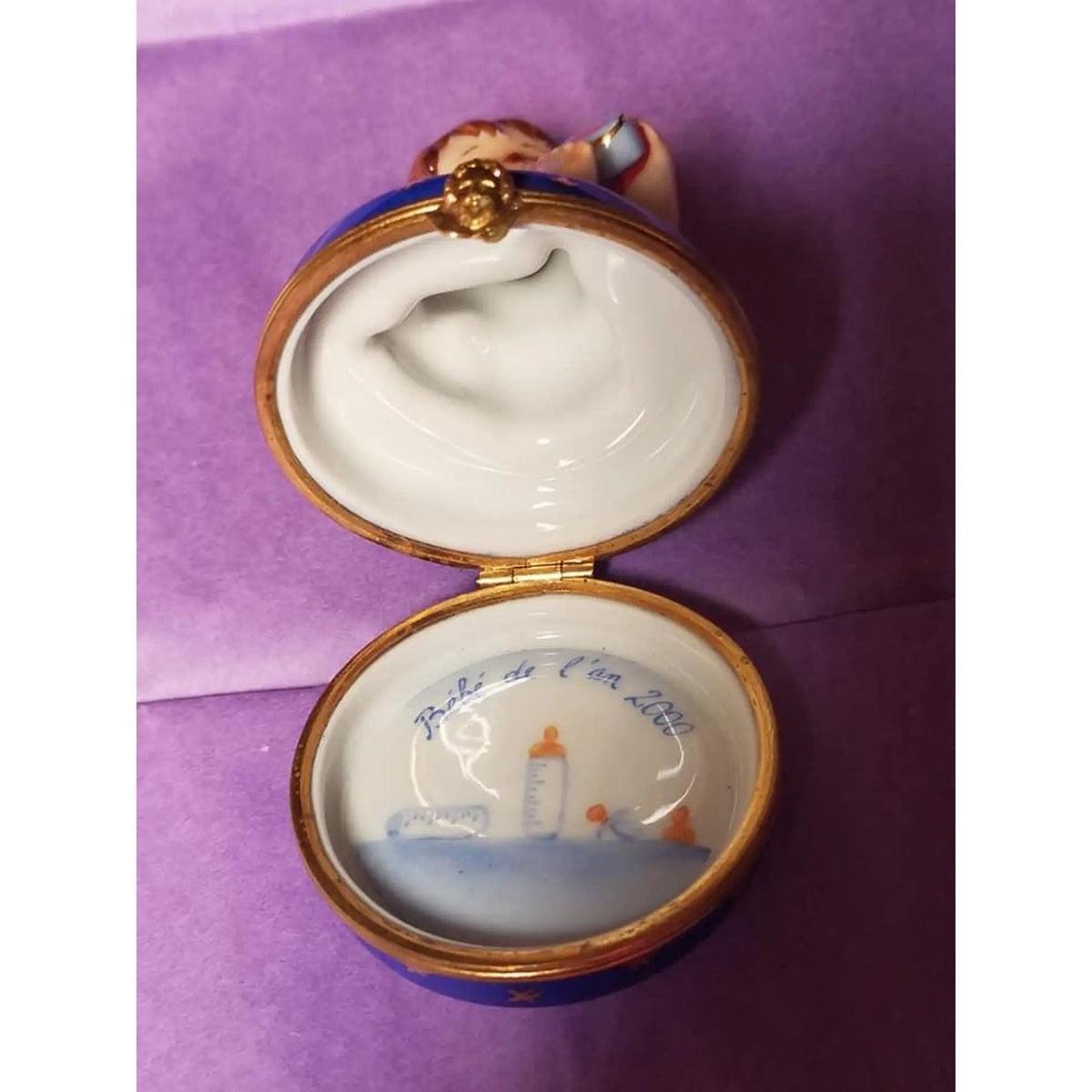 Fine French craftsmanship on the Year 2000 Baby Boy Limoges box, painted by hand