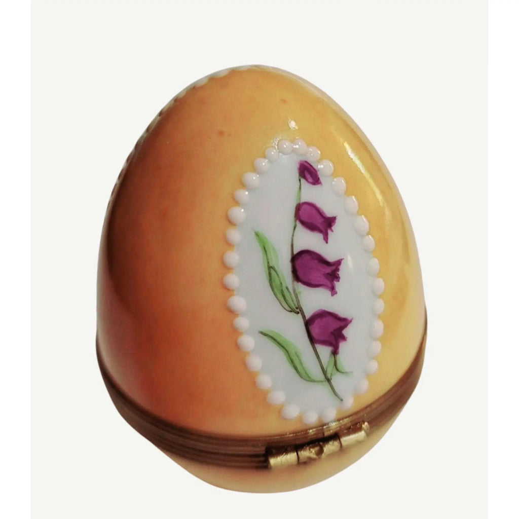 Treasured French collectible: Roses on Yellow Egg Limoges box, painted by hand