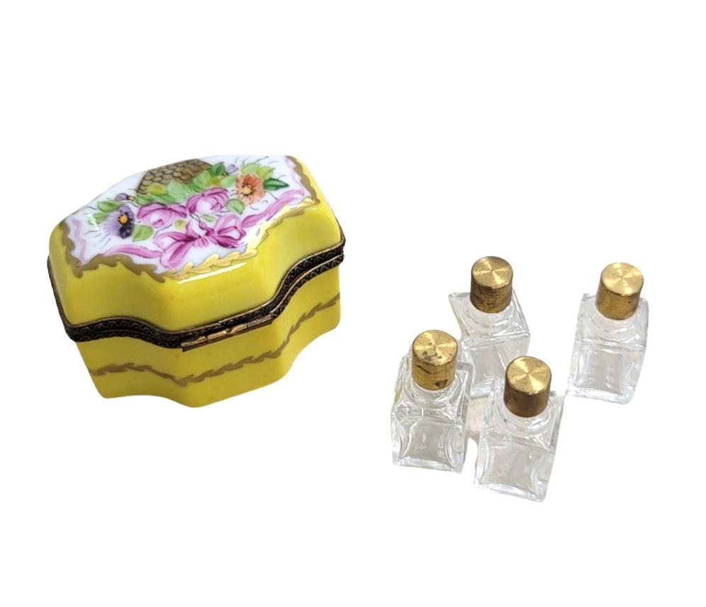 Fine art lovers will admire this 4 Perfume Roses Yellow Limoges box