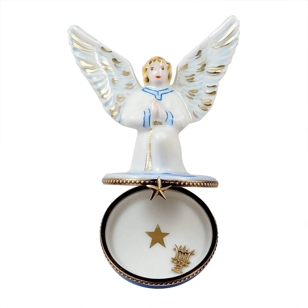 Painted details on the Angel Gabriel Brass Instrument Limoges box, French art in miniature