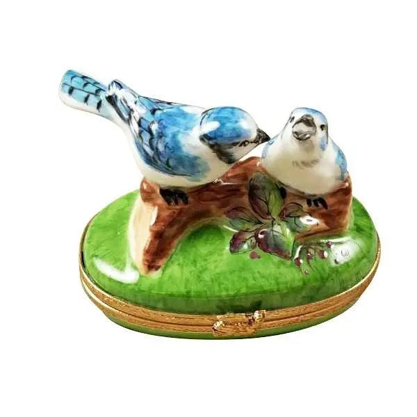 Blue Birds with Limoges Porcelain Eggs Porcelain Art Object, a hand-painted Limoges porcelain gift