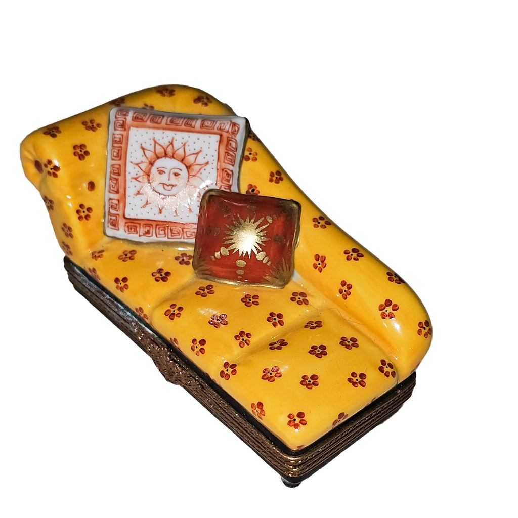 Yellow Fainting Couch Limoges Figurine w Sun Pillow, a hand-painted Limoges porcelain gift