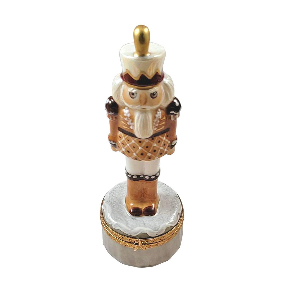 Gingerbread Nutcracker Limoges Box, a hand-painted Limoges porcelain gift