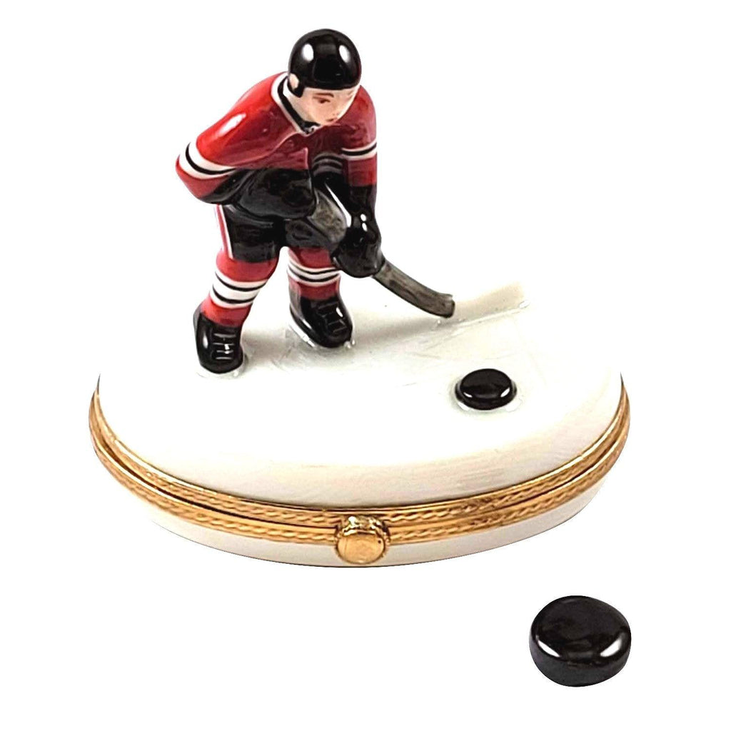Hockey Player with Removable Puck Limoges Box Collectible, a hand-painted Limoges porcelain gift