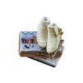 Ice Skates on Book Snow Limoges Box, a hand-painted Limoges porcelain gift