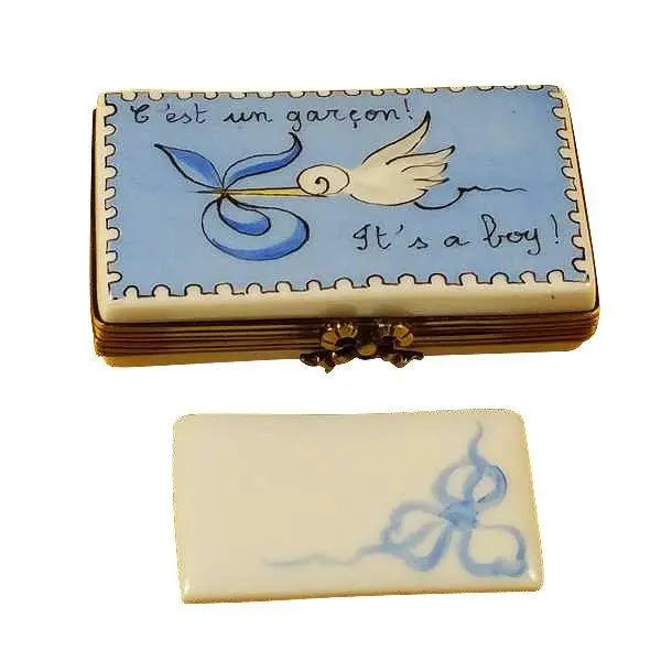 It's a Boy Blue Stork Limoges Box, a hand-painted Limoges porcelain gift