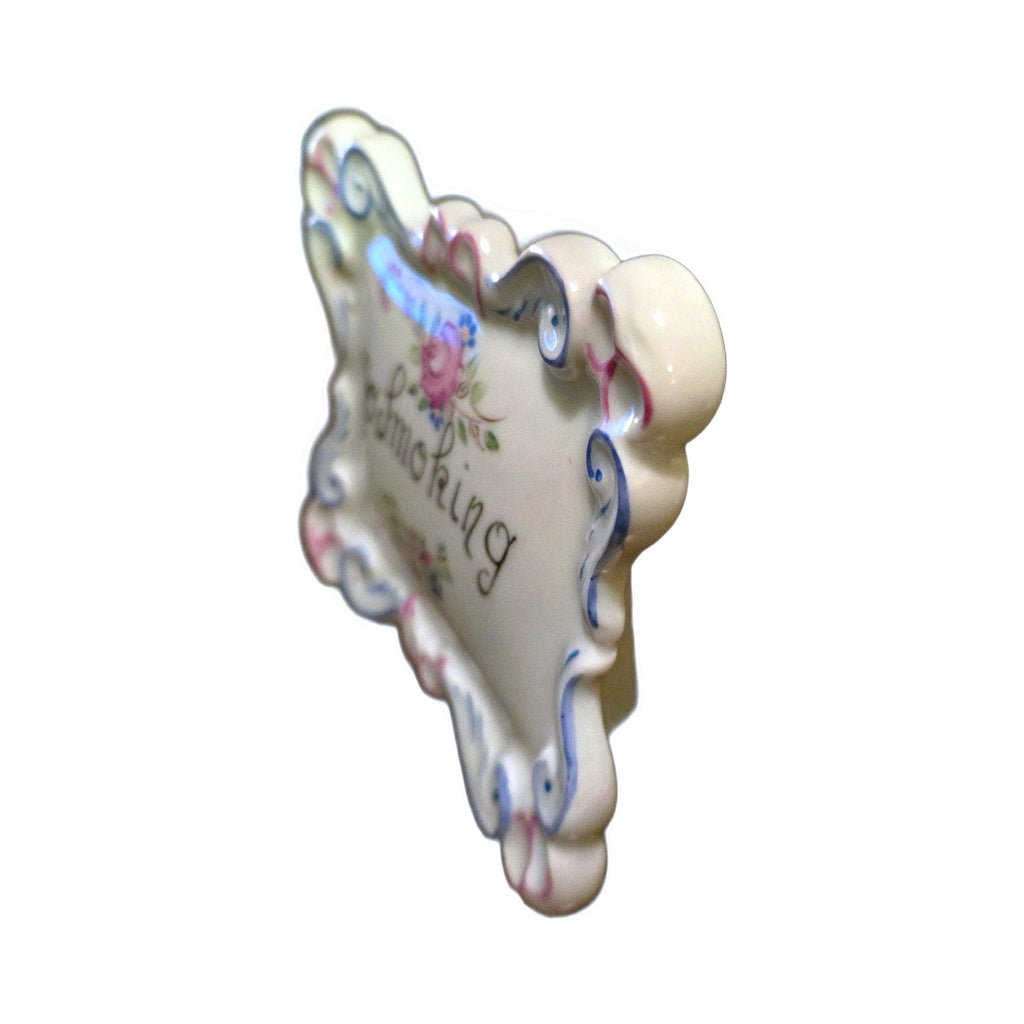 Side view of the free-standing No Smoking porcelain plaque from Limoges