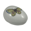 White porcelain egg Limoges box with a painted yellow butterfly, no hinge, made in France