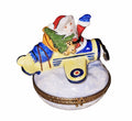 Santa in Yellow Airplane Limoges Box, a hand-painted Limoges porcelain gift