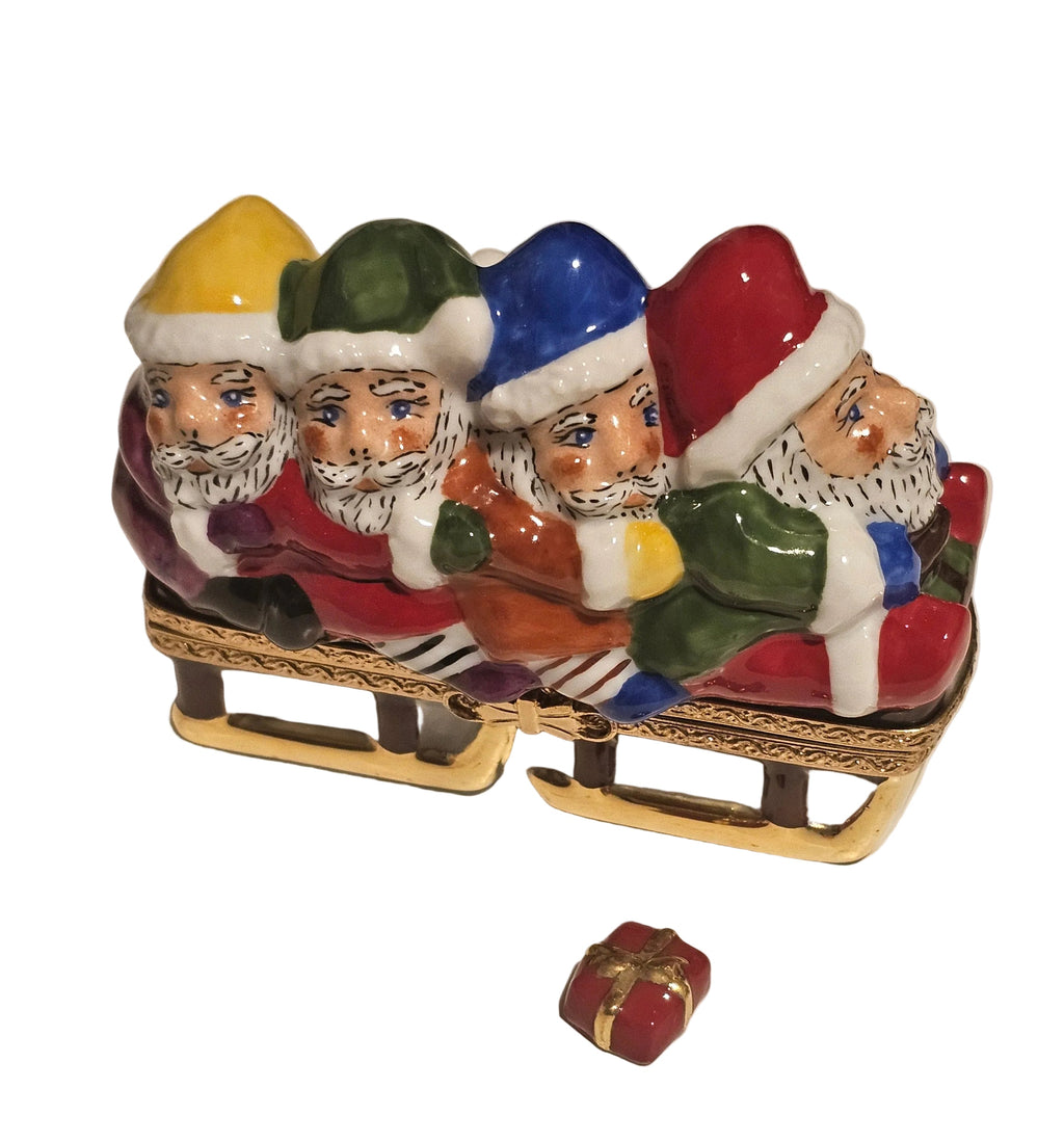Santa in Sleigh w Present Limoges Box, a hand-painted Limoges porcelain gift
