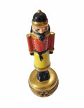 Yellow Nutcracker on Gold, a hand-painted Limoges porcelain gift
