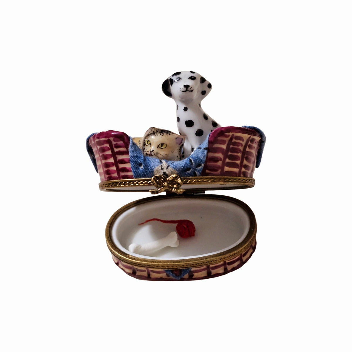 Fine French craftsmanship on the Dalmatian Dog with Cat in Basket with Trinkets Limoges box, painted by hand