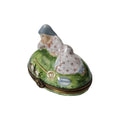 Peasant Woman Laying on Grass, a hand-painted Limoges porcelain gift