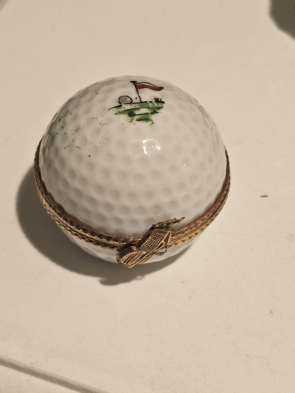 White Golf Ball with Hole Flag Inside, a hand-painted Limoges porcelain gift
