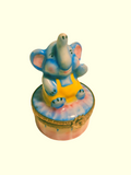 Baby Elephant, a hand-painted Limoges porcelain gift