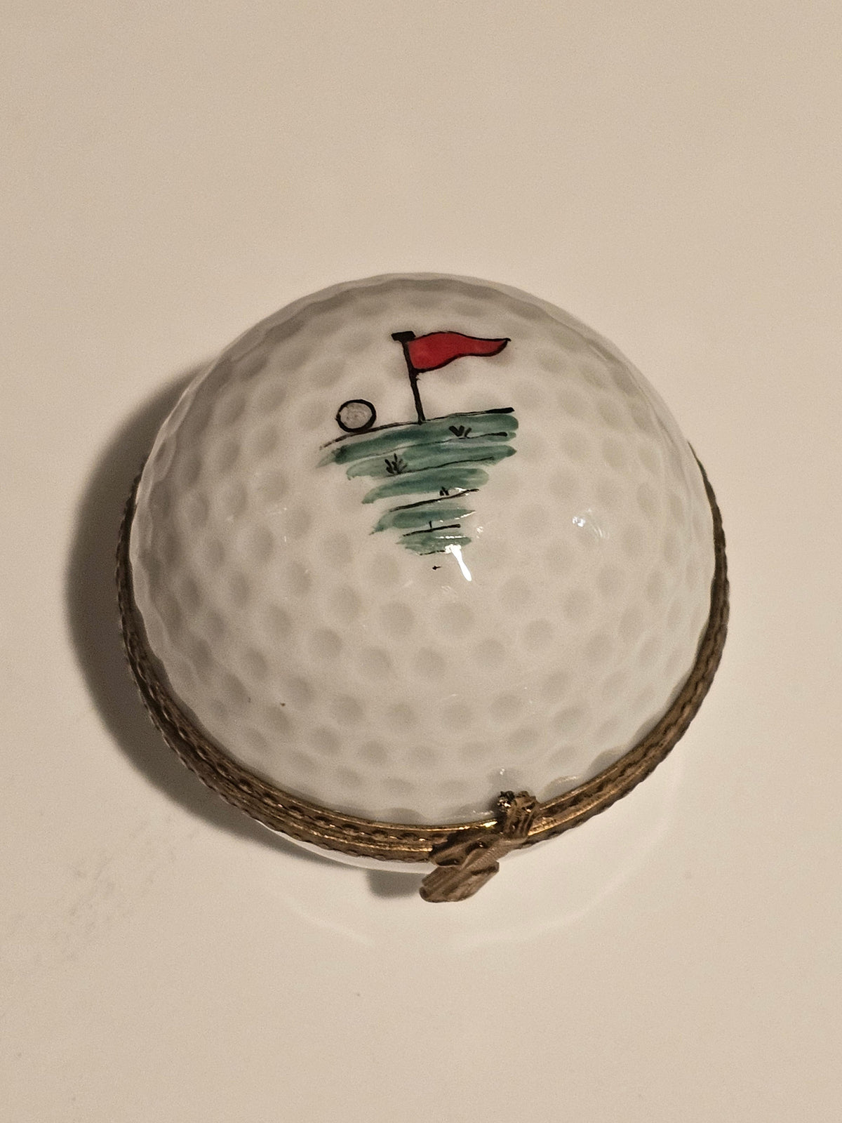 Golf Ball w Hole Flag Painting Inside, a hand-painted Limoges porcelain gift