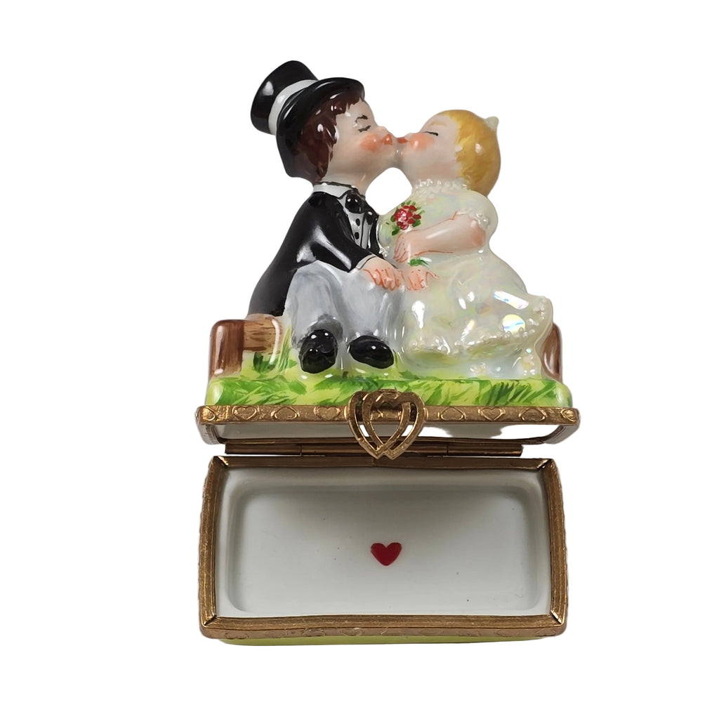 Kissing Couple on Bench, view 2