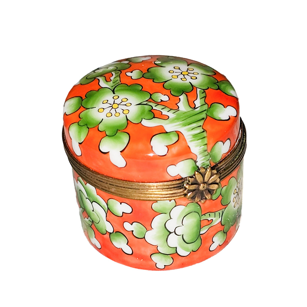 Green Flowers on Orange Round Tall Limoges Box, a hand-painted Limoges porcelain gift